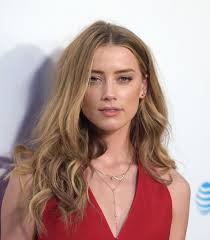 How tall is Amber Heard?